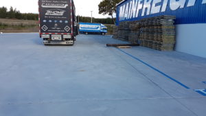 Trucks drive over strong concrete loading bay
