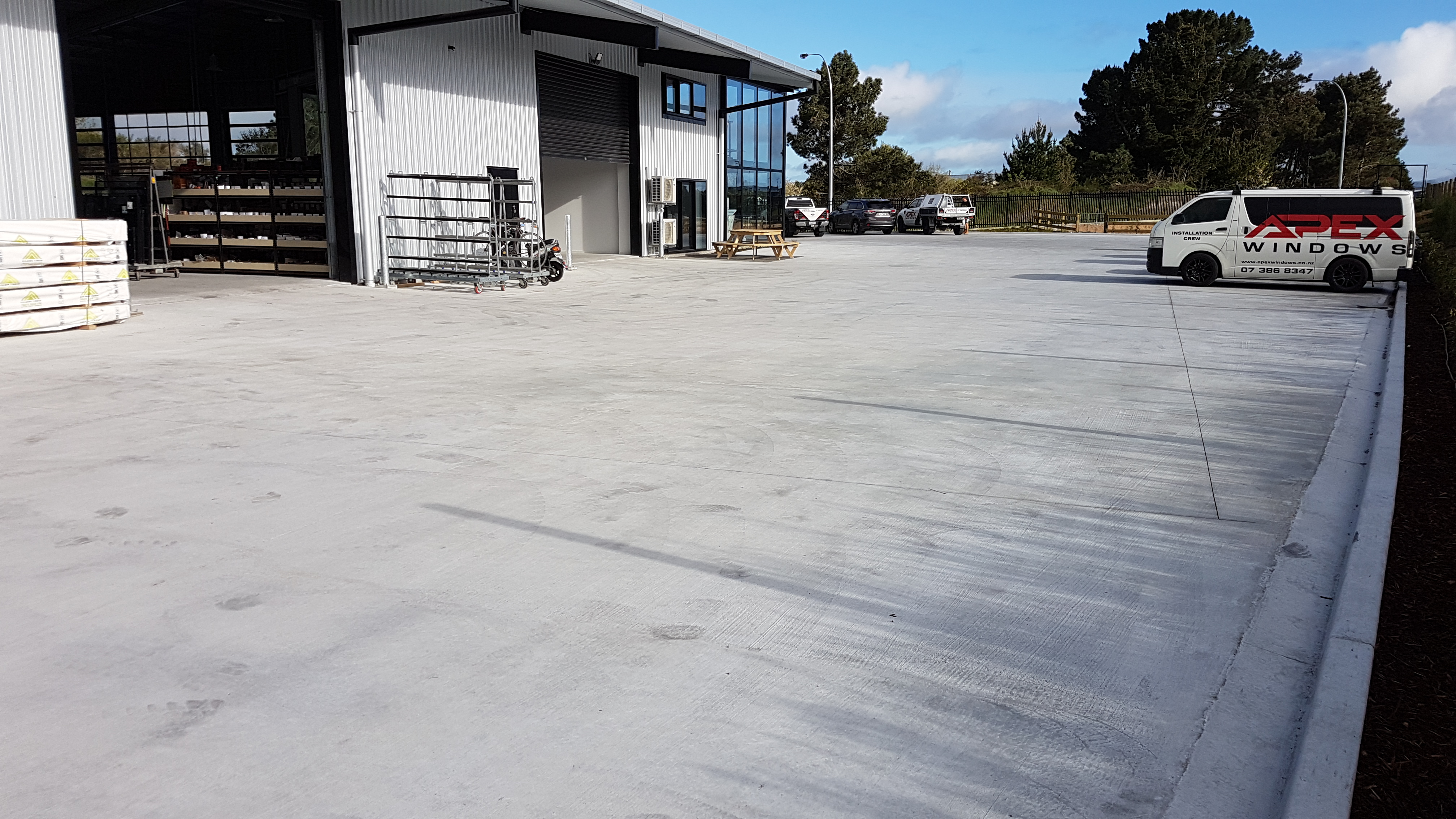 Concrete work in a commercial yard loading bay and parking zone with concrete reinforced with Inforce Proforce hookend steel fibre